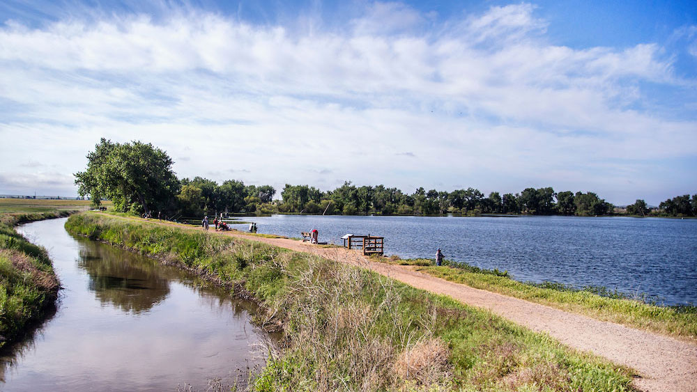 Paved trail along shore of Barr Lake