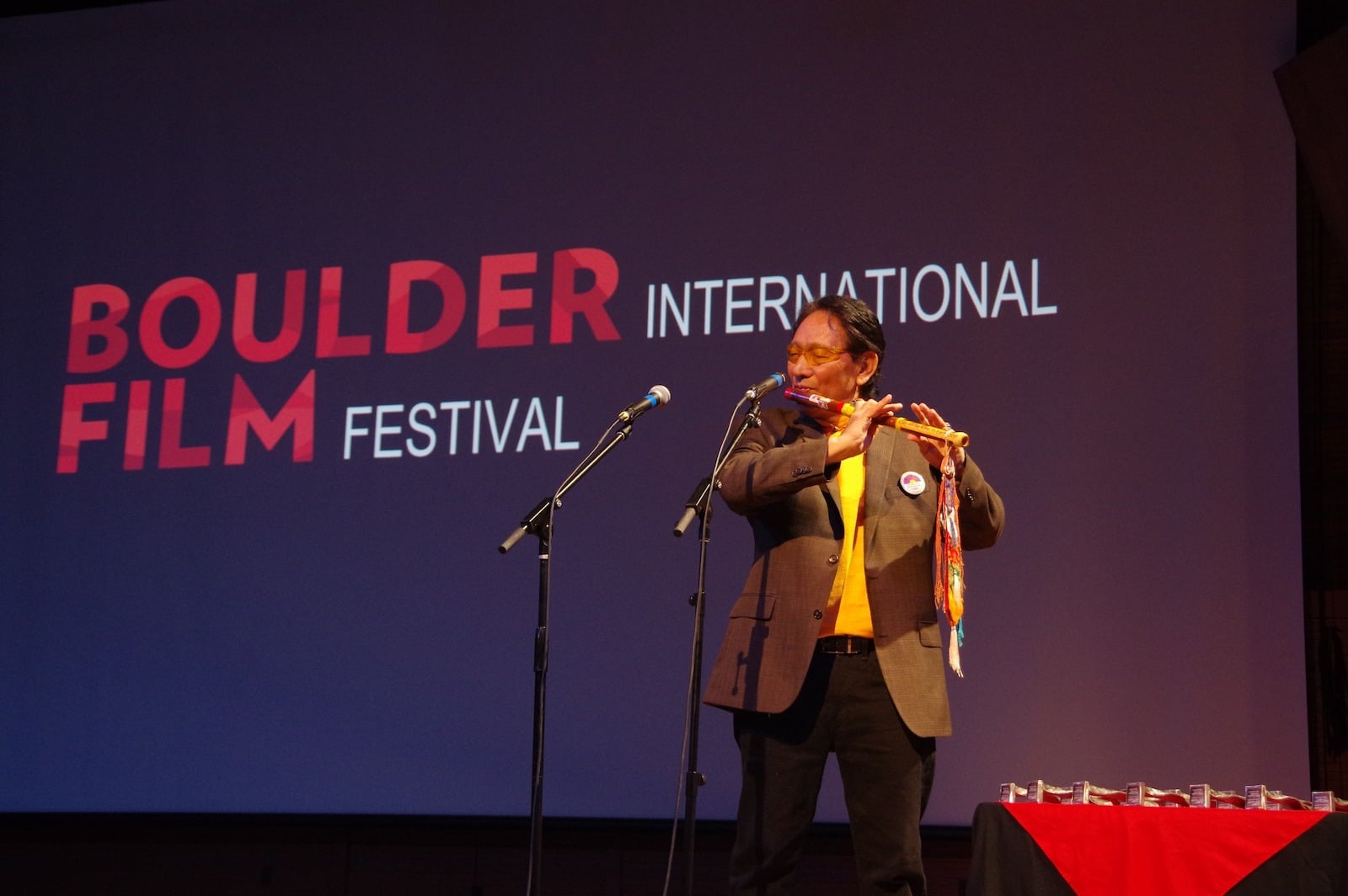 Image of a person performing at the Boulder International Film Festival in Colorado