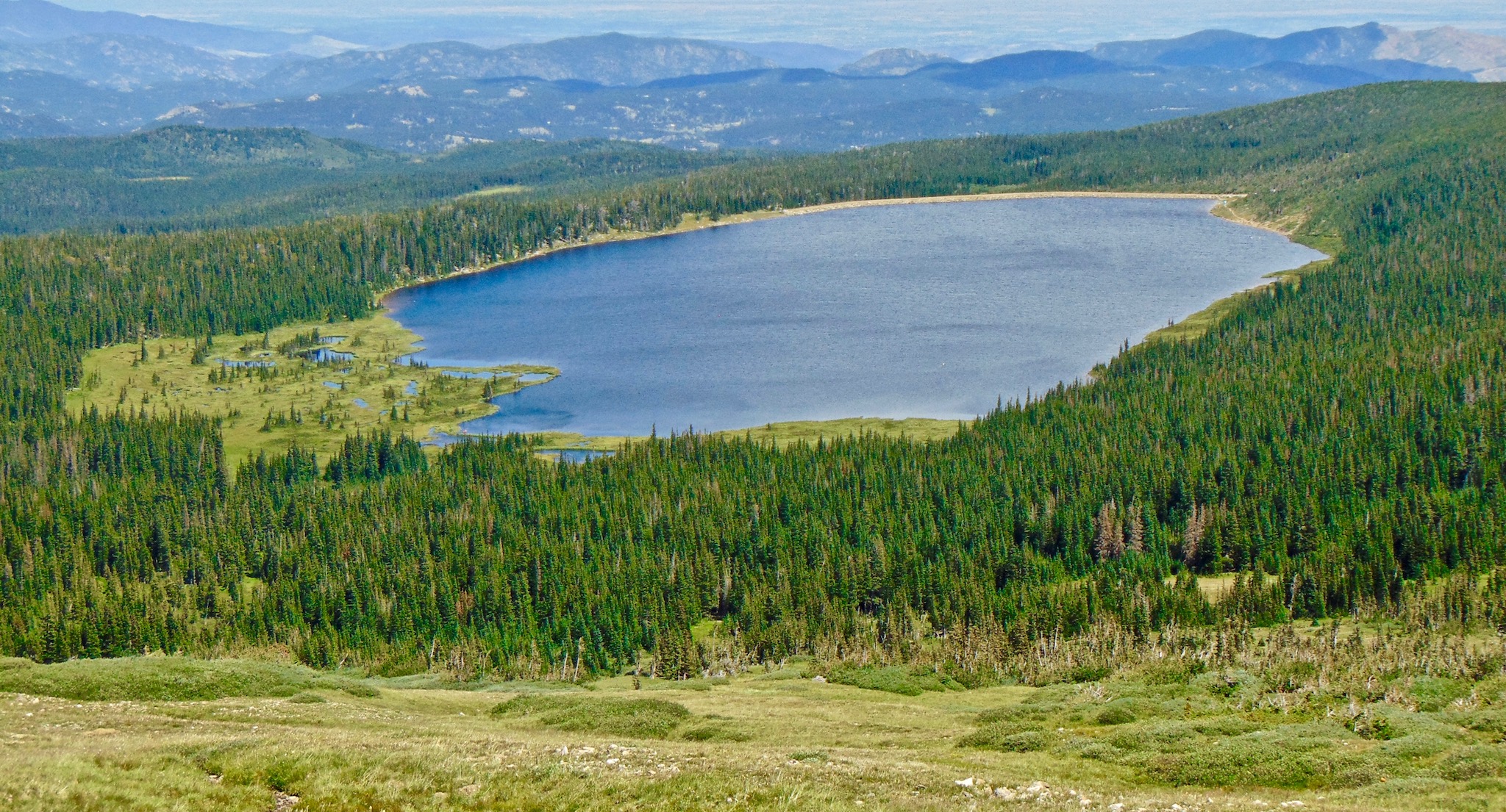 Looking down at the tranquil water of Left-Hand Reservoir from Niwot Ridge.