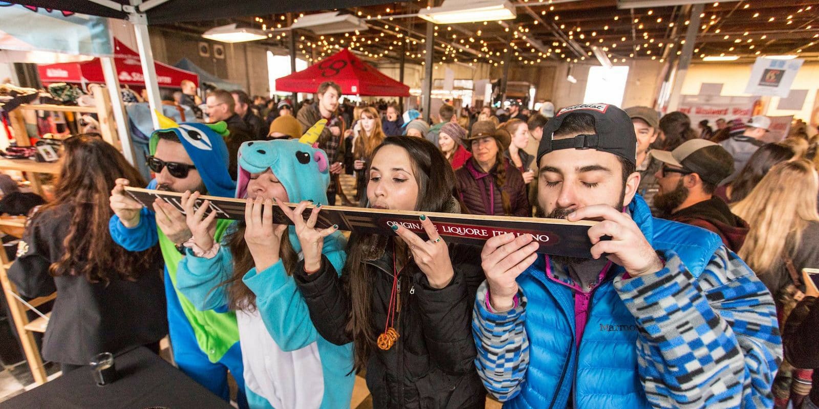 Image of people taking a skit shot at the Mile High Beer Festival in Denver, Colorado