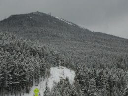 Snow covered Squaw Mountain peak