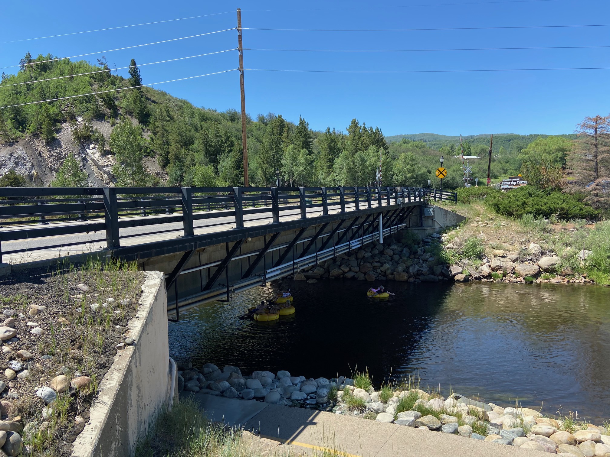 Tubing under a bridge Yampa River Steamboat Springs