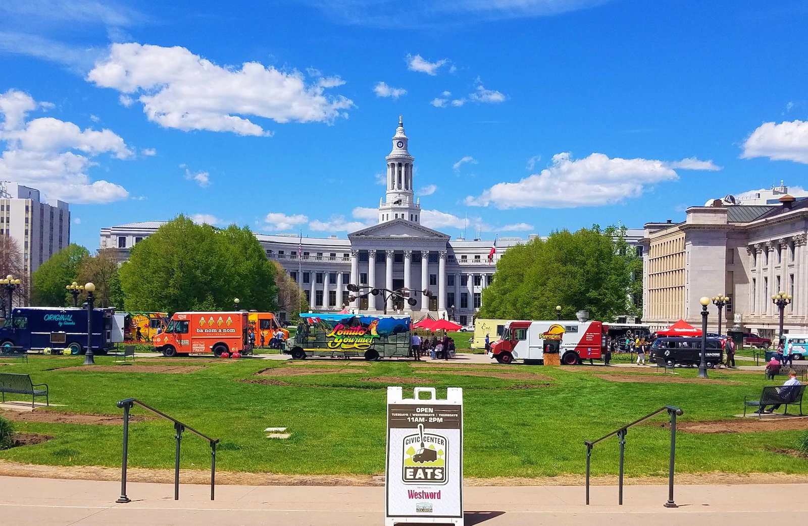 Image of food trucks lined up for Civic Center Eats Collaboration Festival in Denver, Colorado