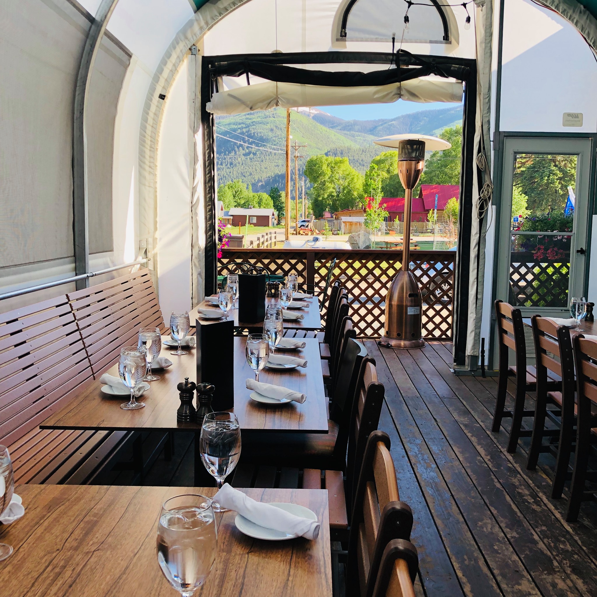 outdoor dining tables at a restaurant