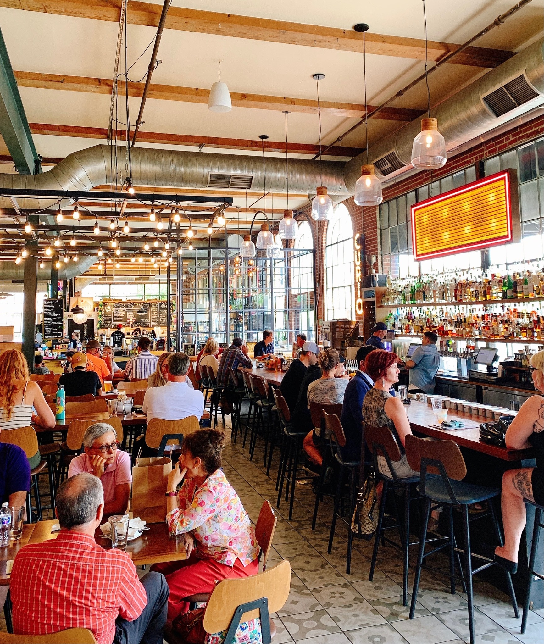 Busy interior of food hall in denver