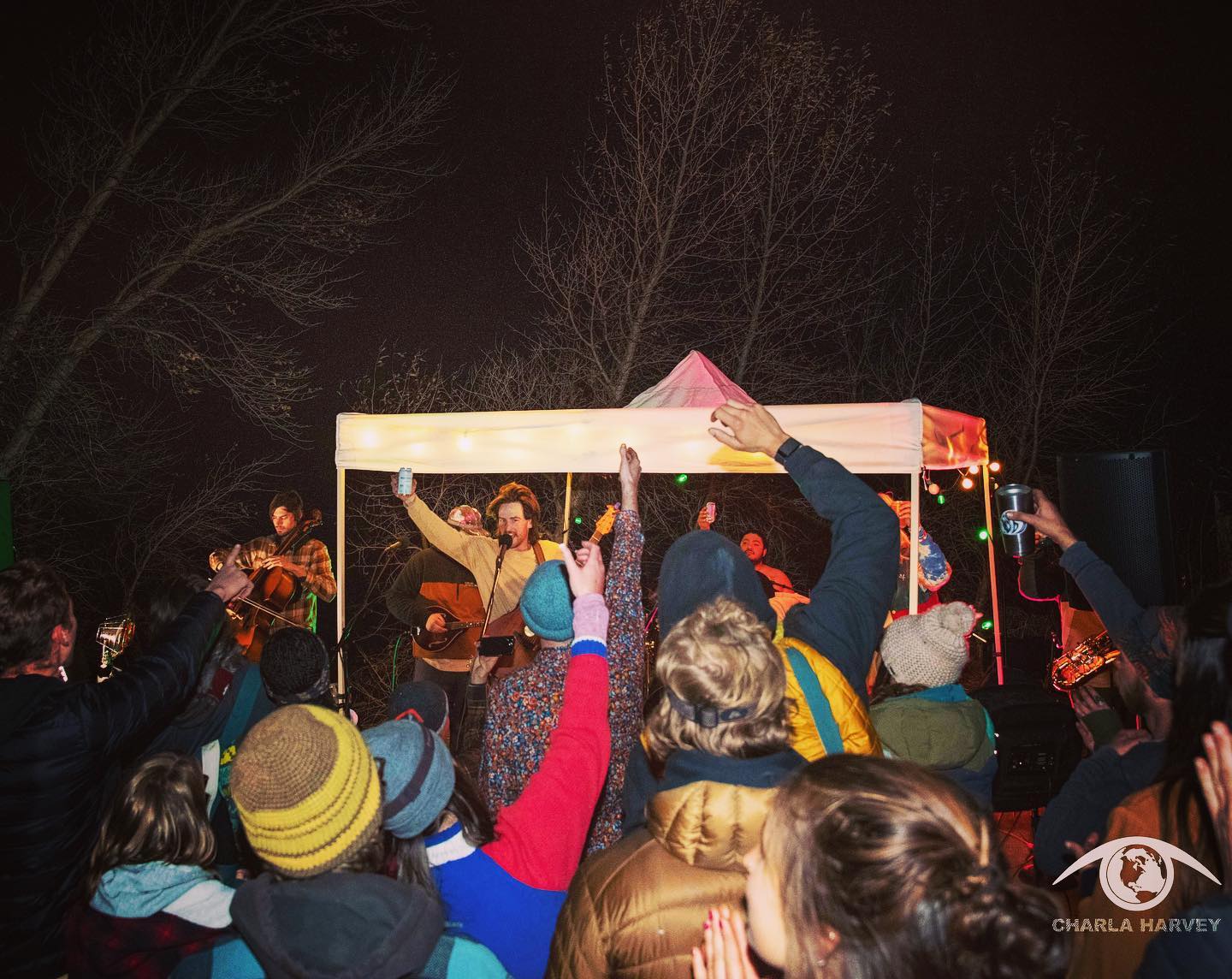 Performers singing and crowd