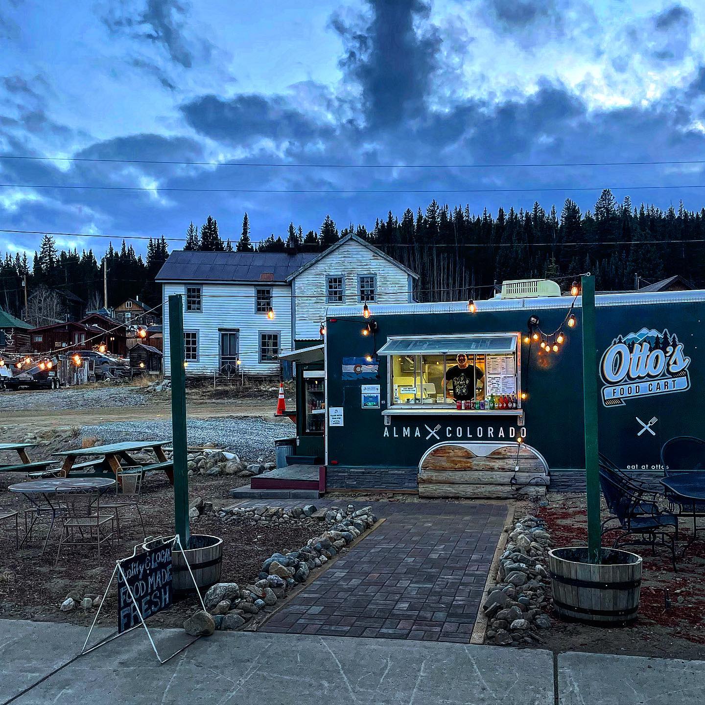 Outdoor food cart at dusk