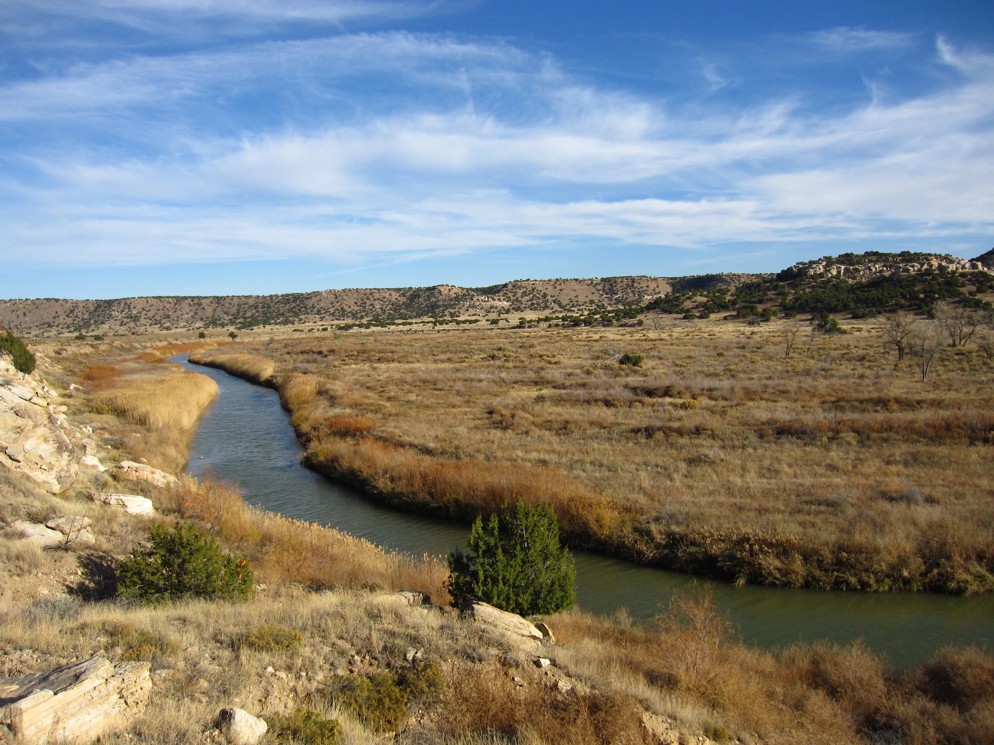 The gentle, meandering course of the Purgatoire River makes for relaxing fishing.