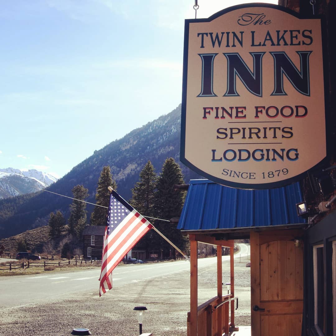 Hanging sign for Twin Lakes Inn