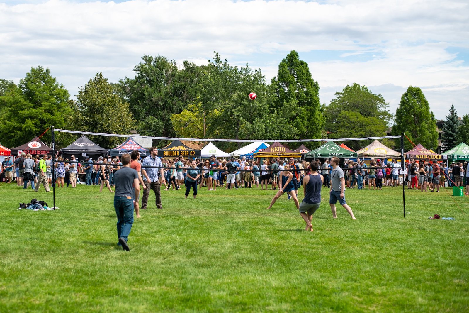 Image of people playing volleyball at the Boulder Craft Beer Festival in Colorado