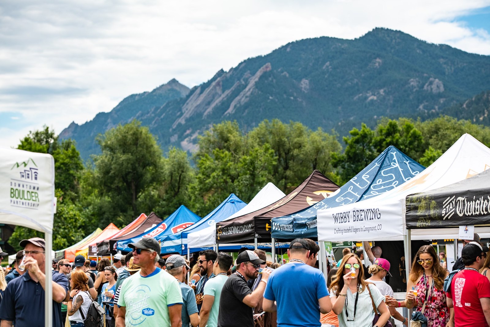 Image of people exploring the booths at the Boulder Craft Beer Festival in Colorado