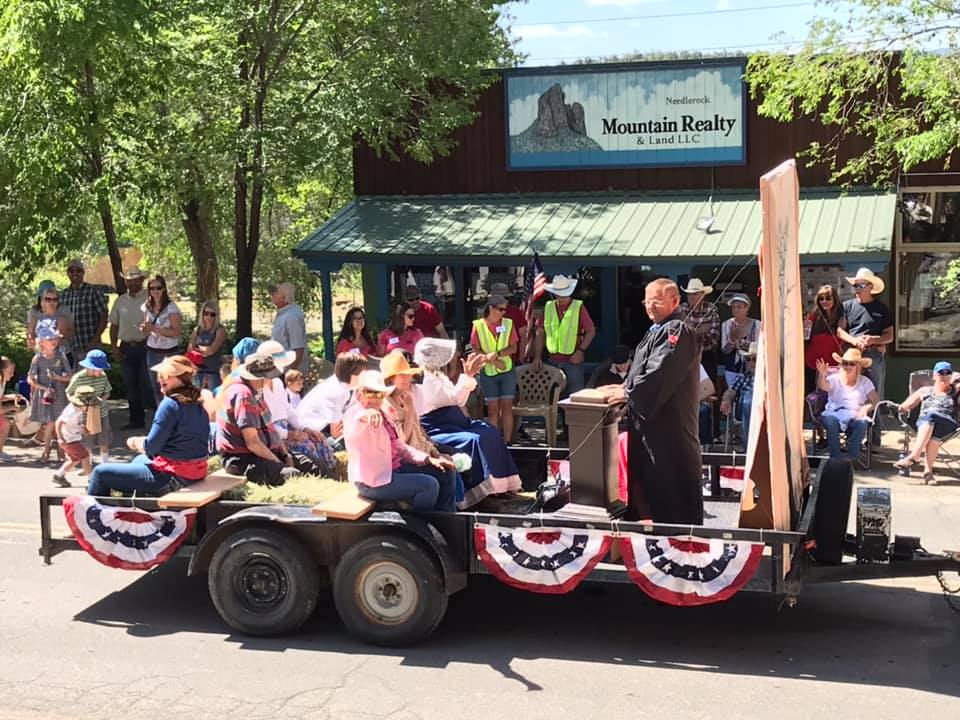 Parade float with a Pioneer theme