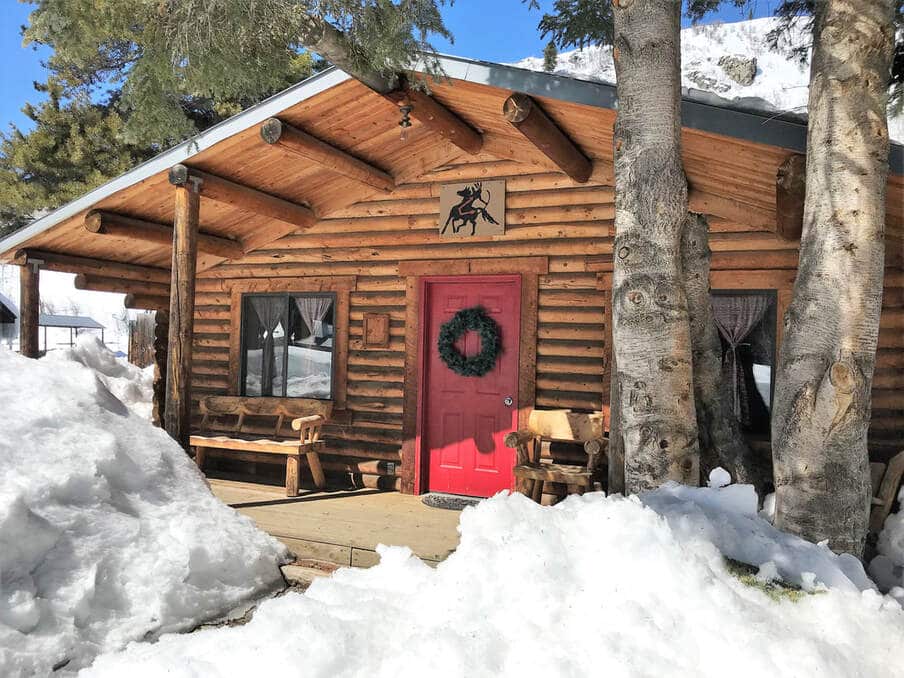 Front of ranch lodge in snow