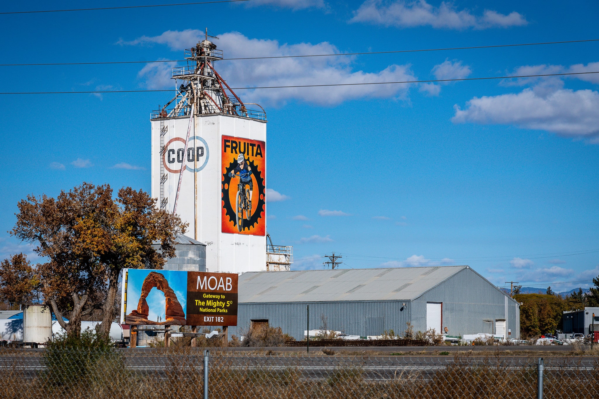 Co-op with large orange sign