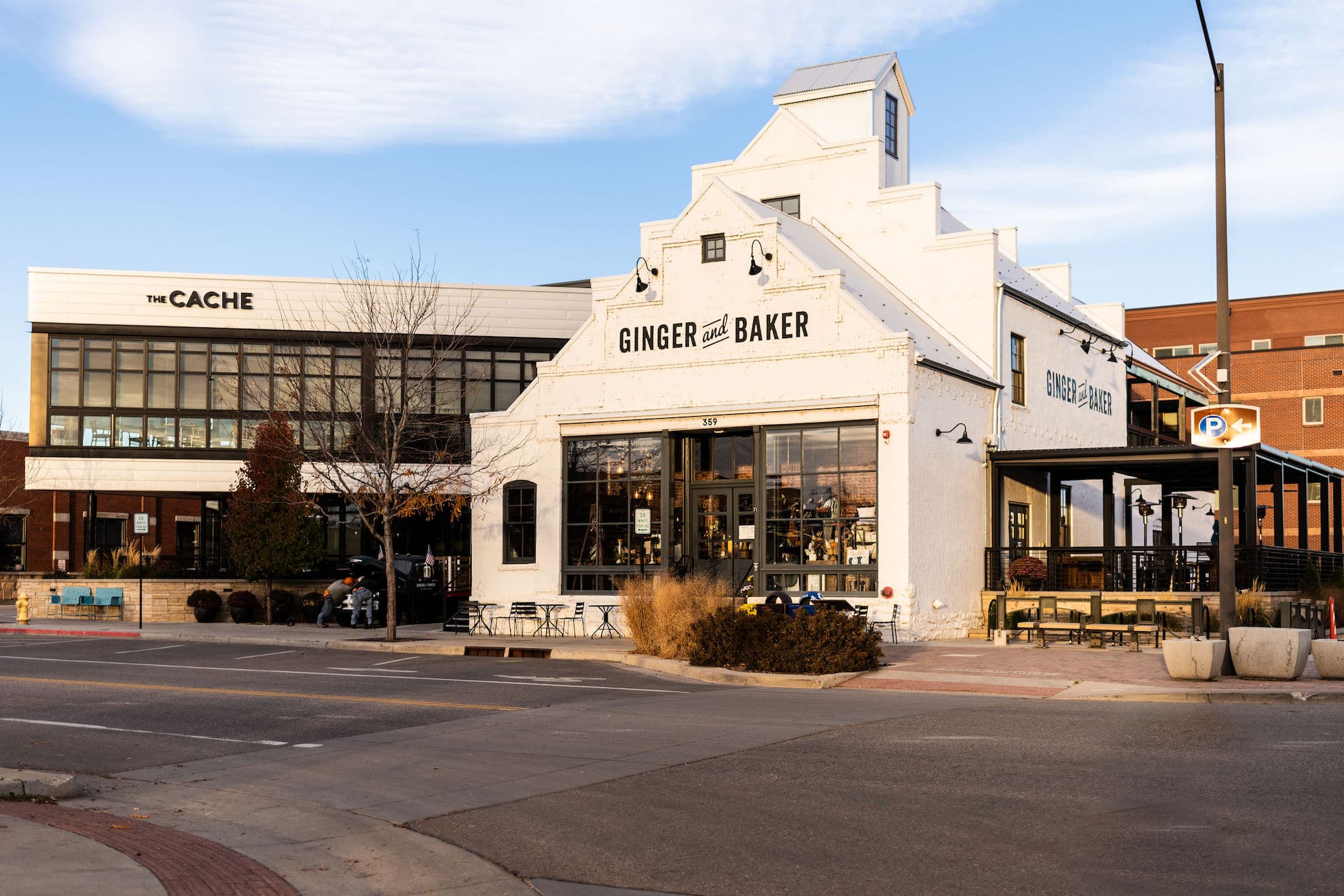 White building with a restaurant and bakery inside