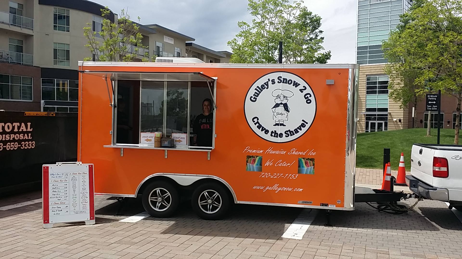 Orange shaved ice food truck