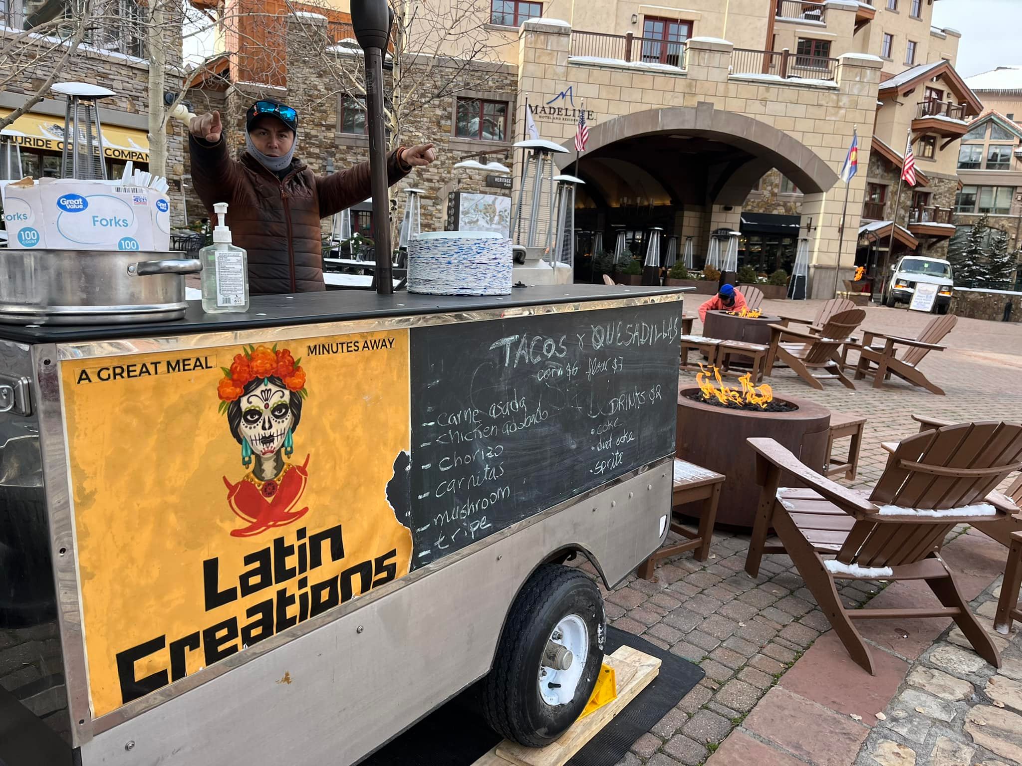 Yellow Latin Creations food stand