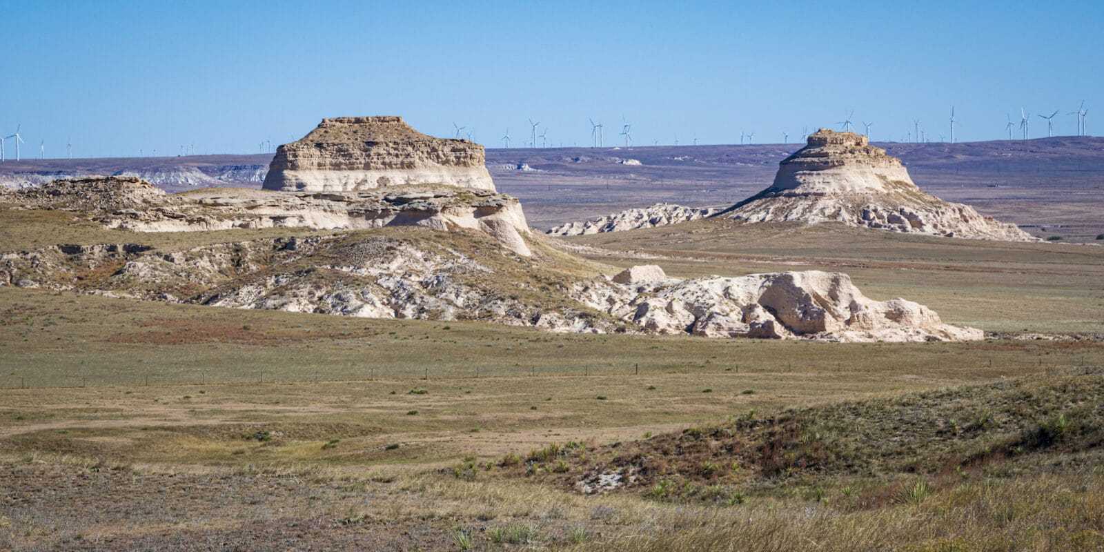 Two buttes poking up out of the grasslands of eastern Colorado.