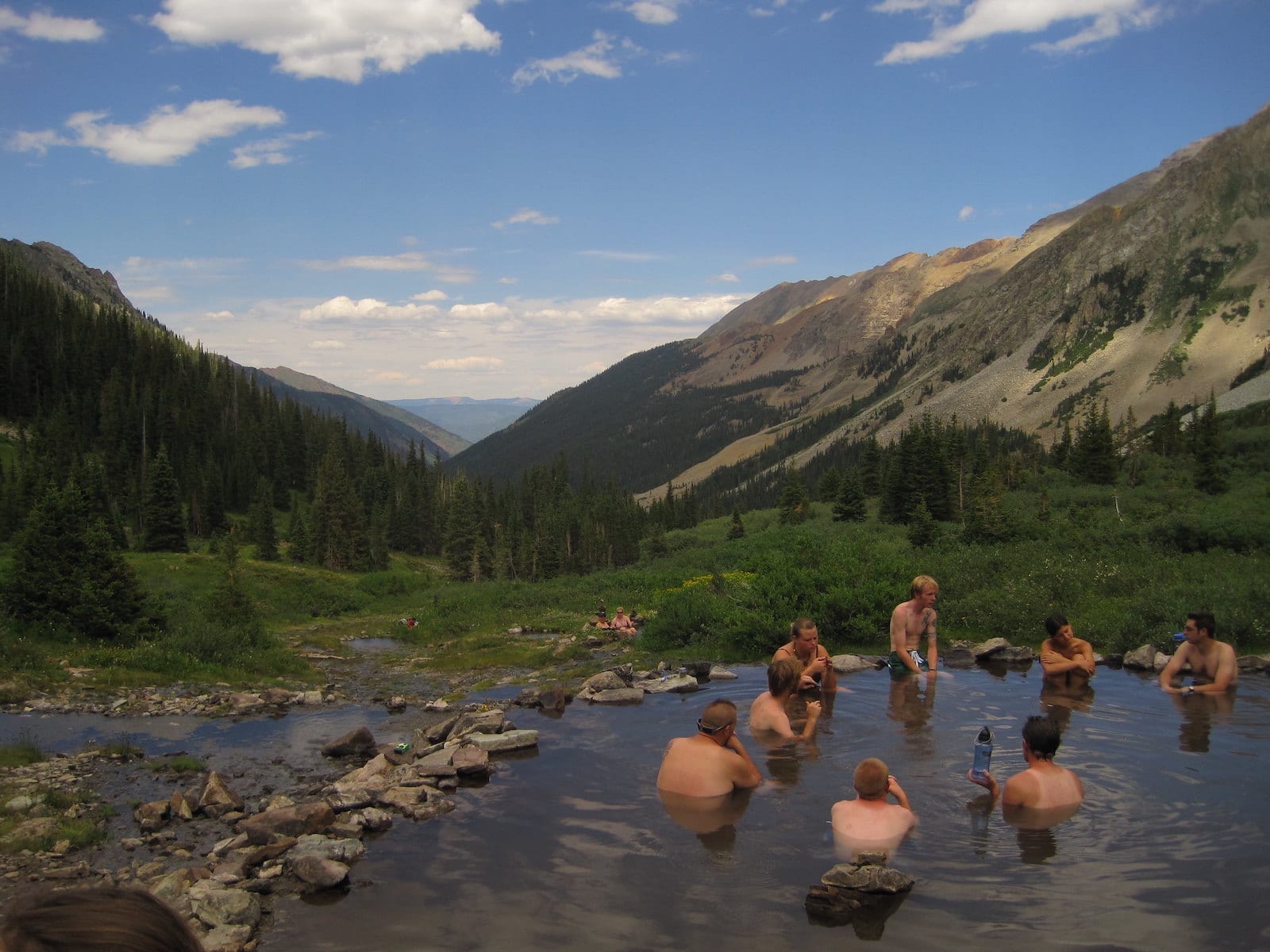 Image of people at Conundrum Hot Springs in Aspen, Colorado