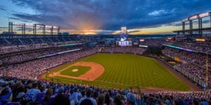 Sun is just finishing its sunset over Coors Field in Denver CO