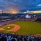 Sun is just finishing its sunset over Coors Field in Denver CO