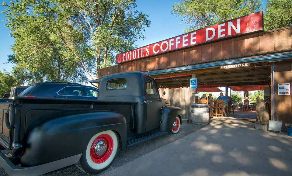 Coffee shop front with truck parked outside