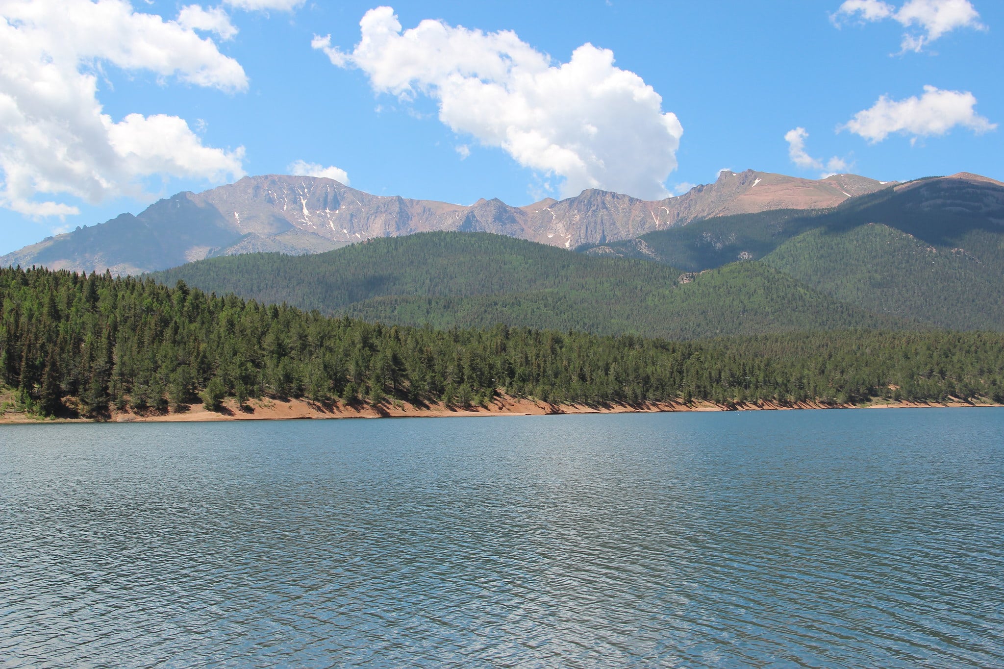 Lake with mountains in the background