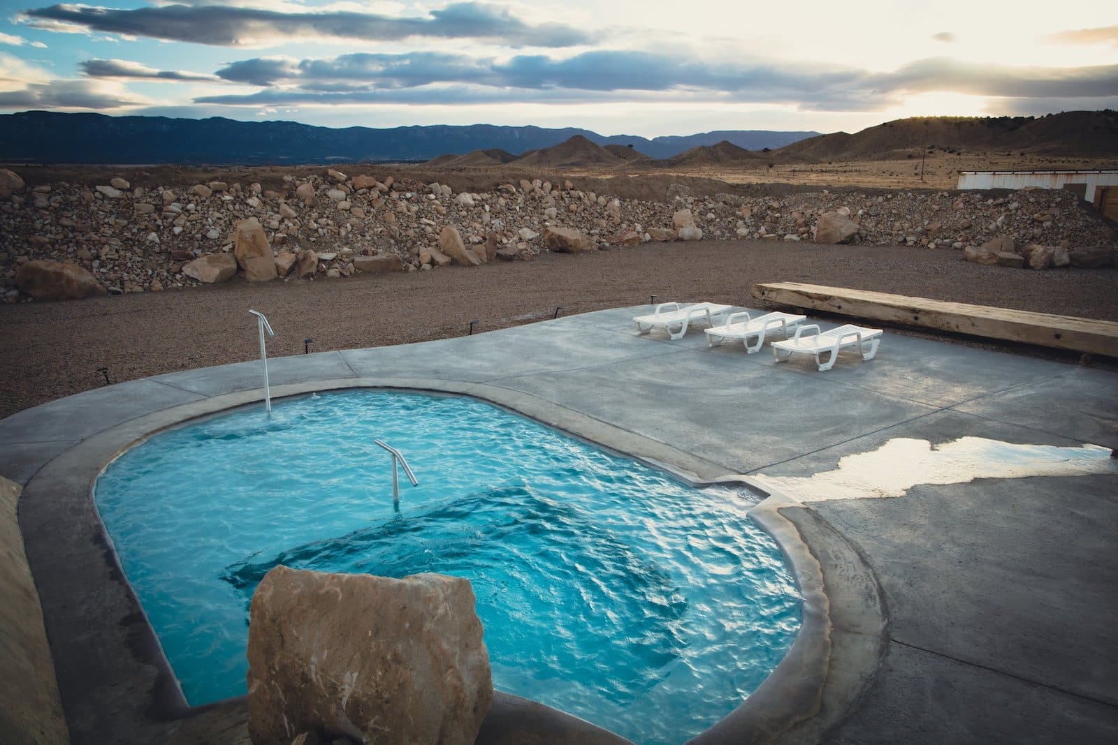 Desert Reef Hot Springs Pool and front range mountains Colorado