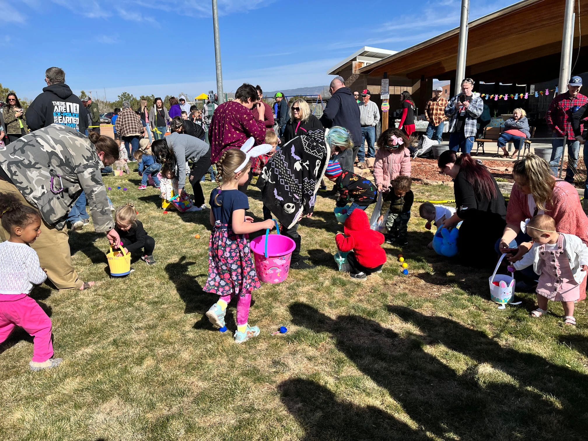 Children on an Easter egg hunt in the community park