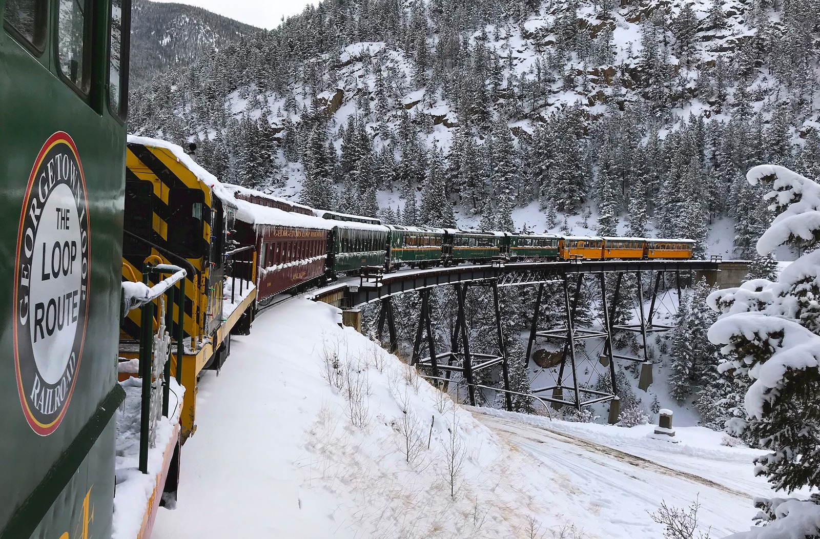 Image of the Georgetown Loop Railroad covered in snow in Colorado