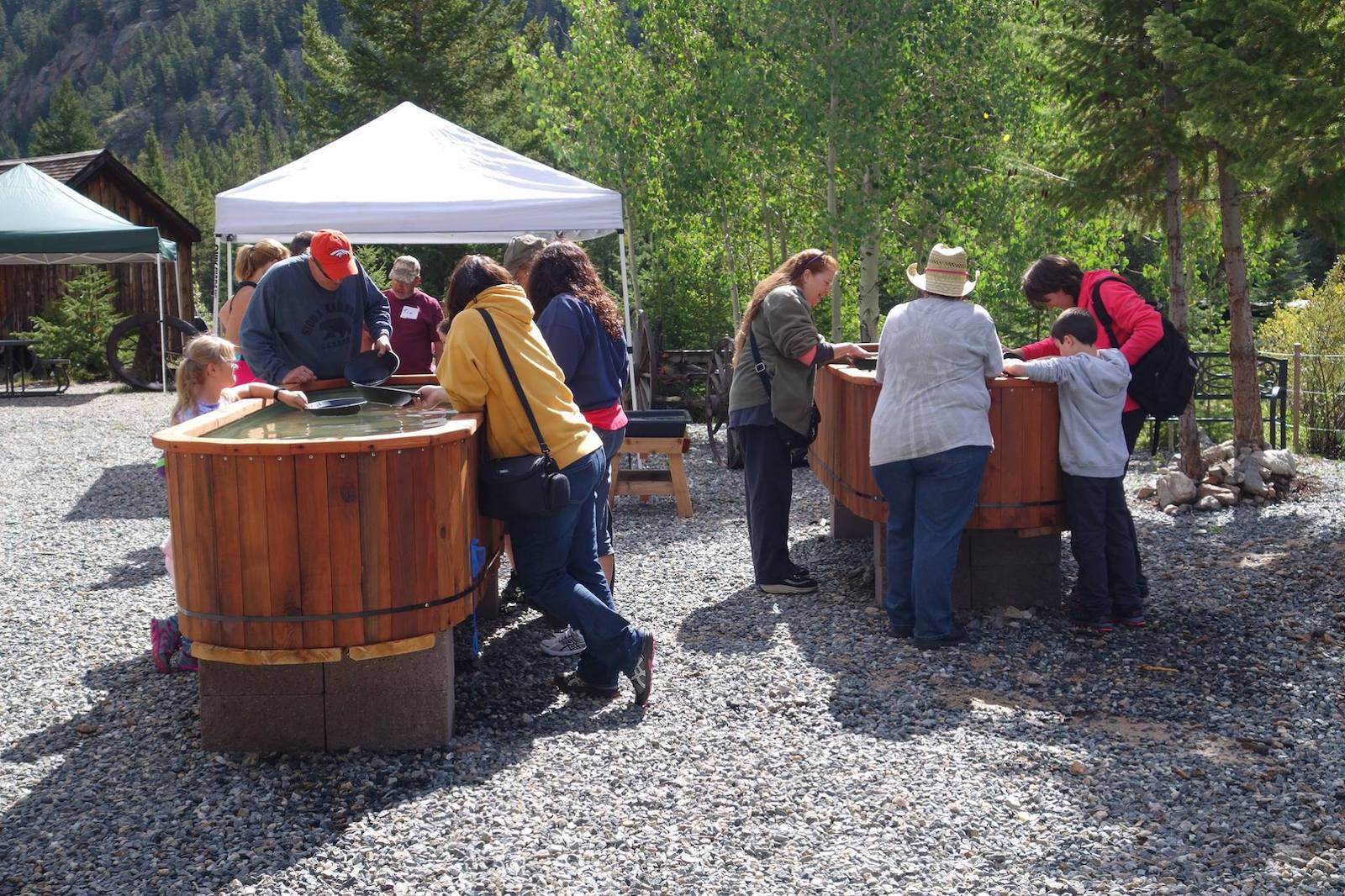 Image of people gold panning at Evertt Mine, part of the Georgetown Loop Railroad