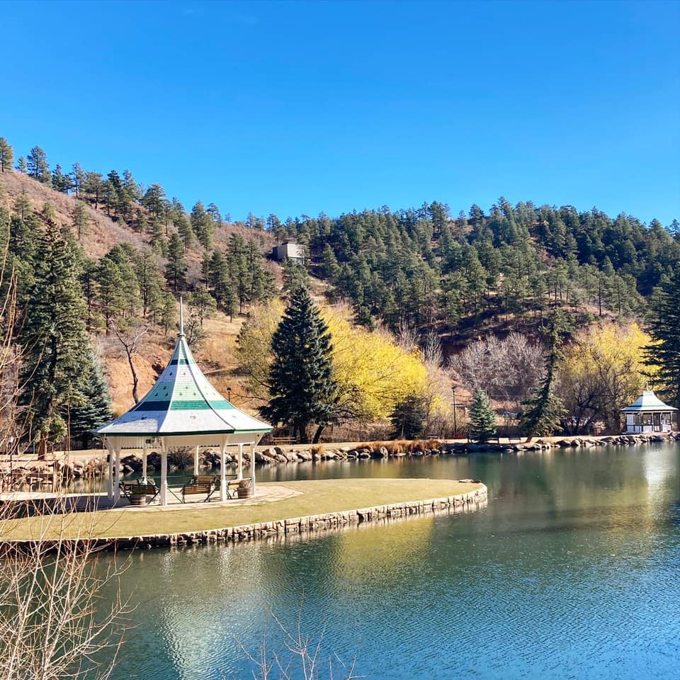 Sunny day over a gazebo on a pond