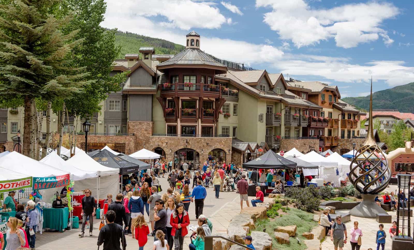 Image of people and vendors at the Vail Farmers Market in Colorado