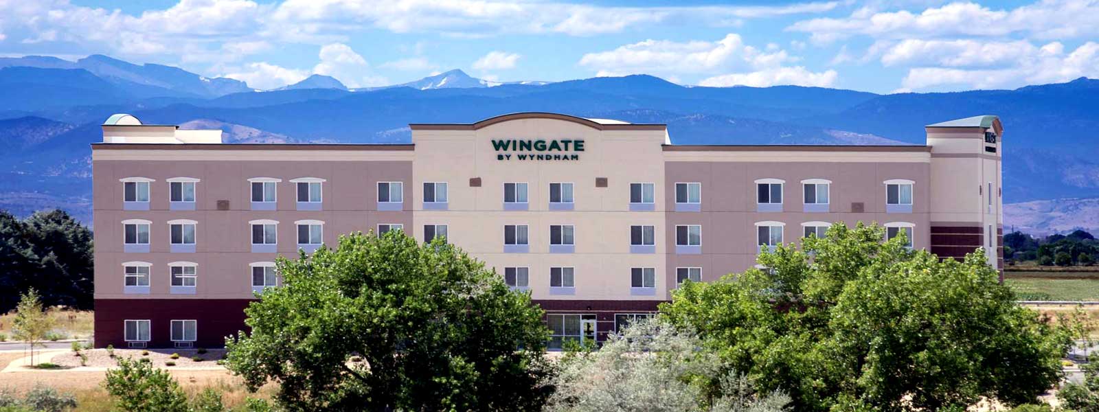 Wingate hotel with mountains in the background