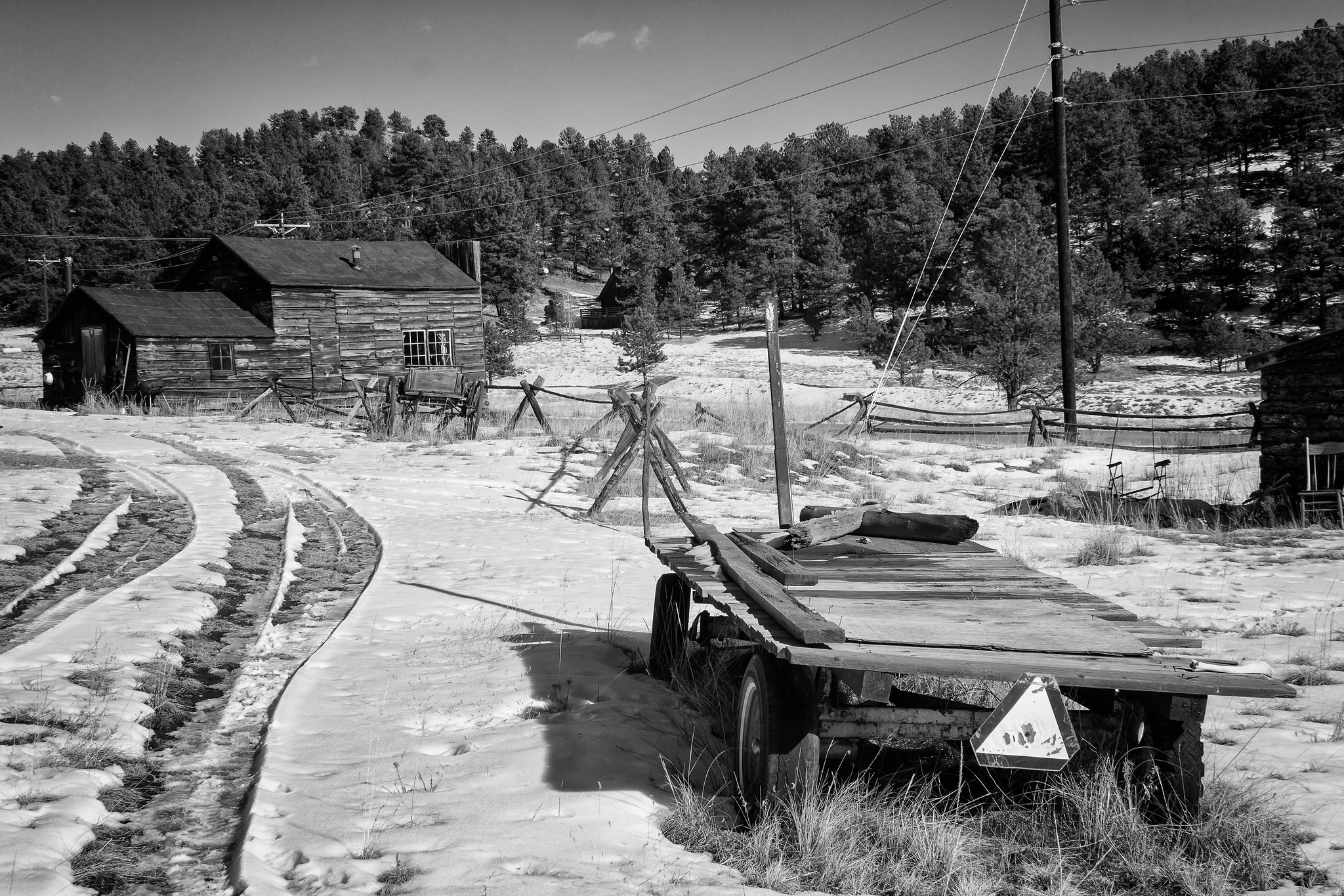 Black and white picture of an old hay wagon