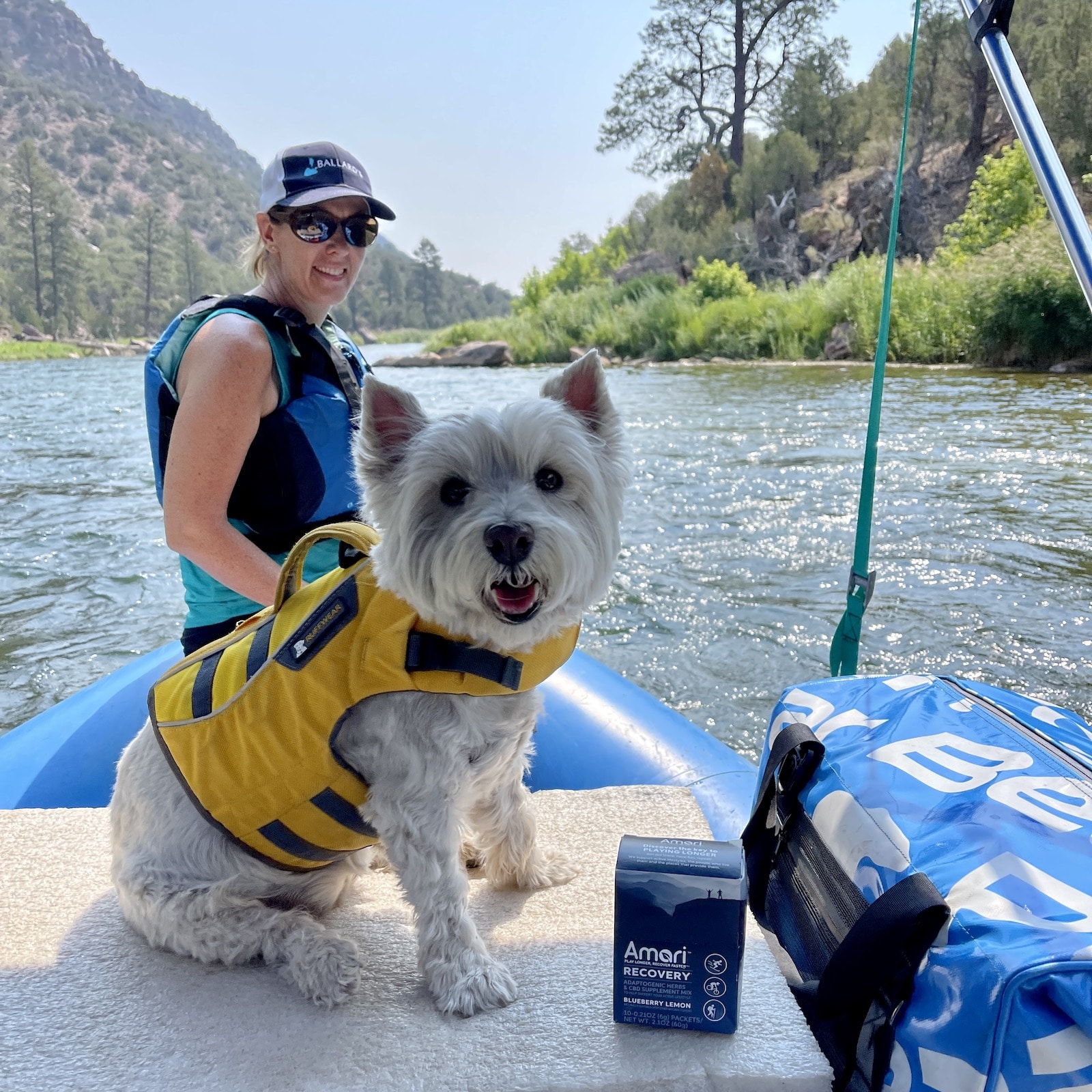 Image of a person and a dog on a boat with Amari Botanicals Recovery product