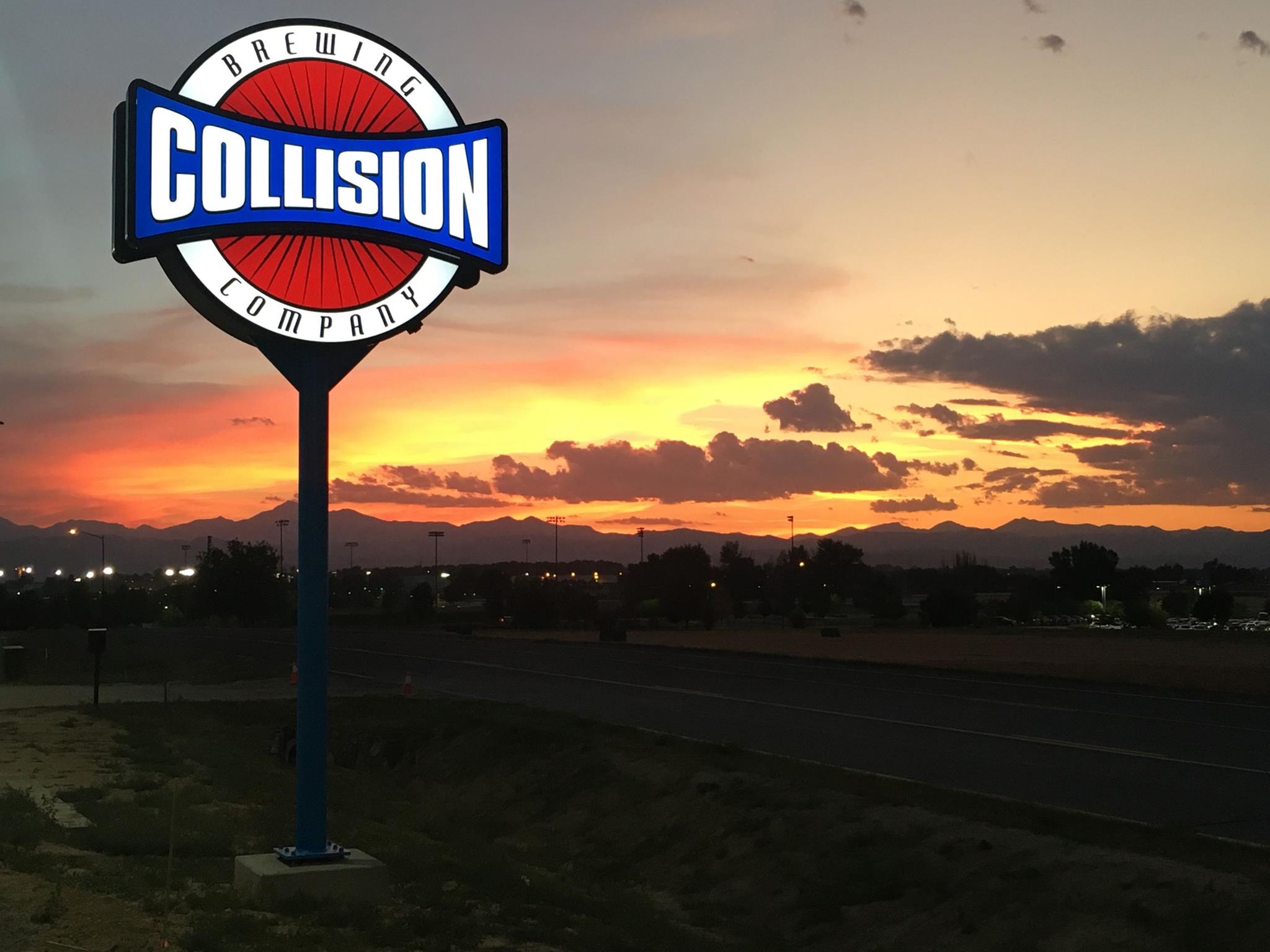 Sunset behind Collision Brewing sign