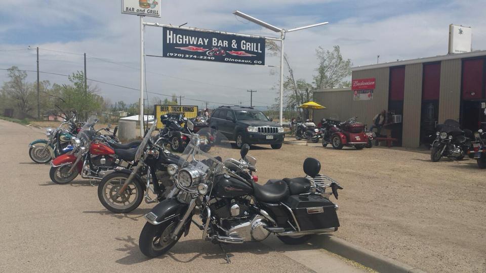 Motorcycles parked outside dive bar