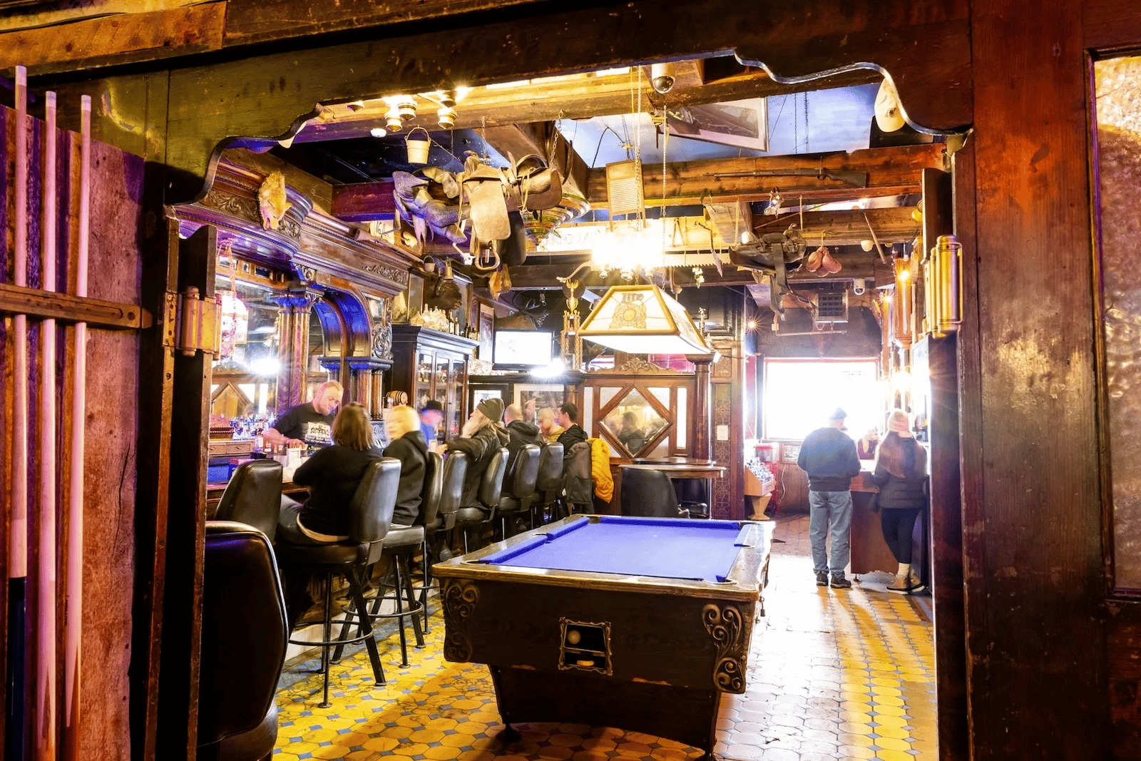 Image of the pool table and bar at The Legendary Silver Dollar Saloon in Leadville, Colorado