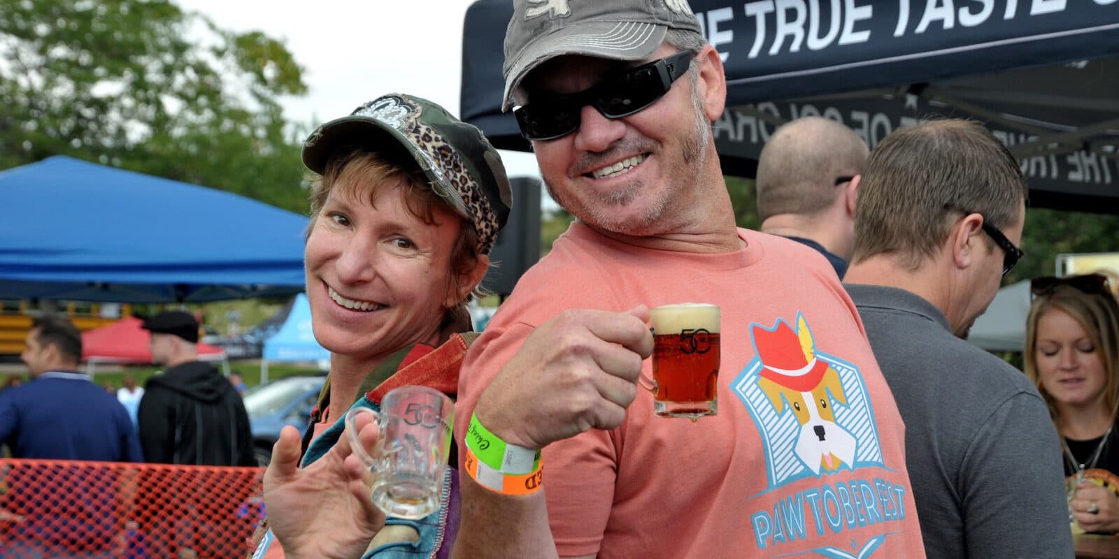 Image of people drinking at Pawtoberfest