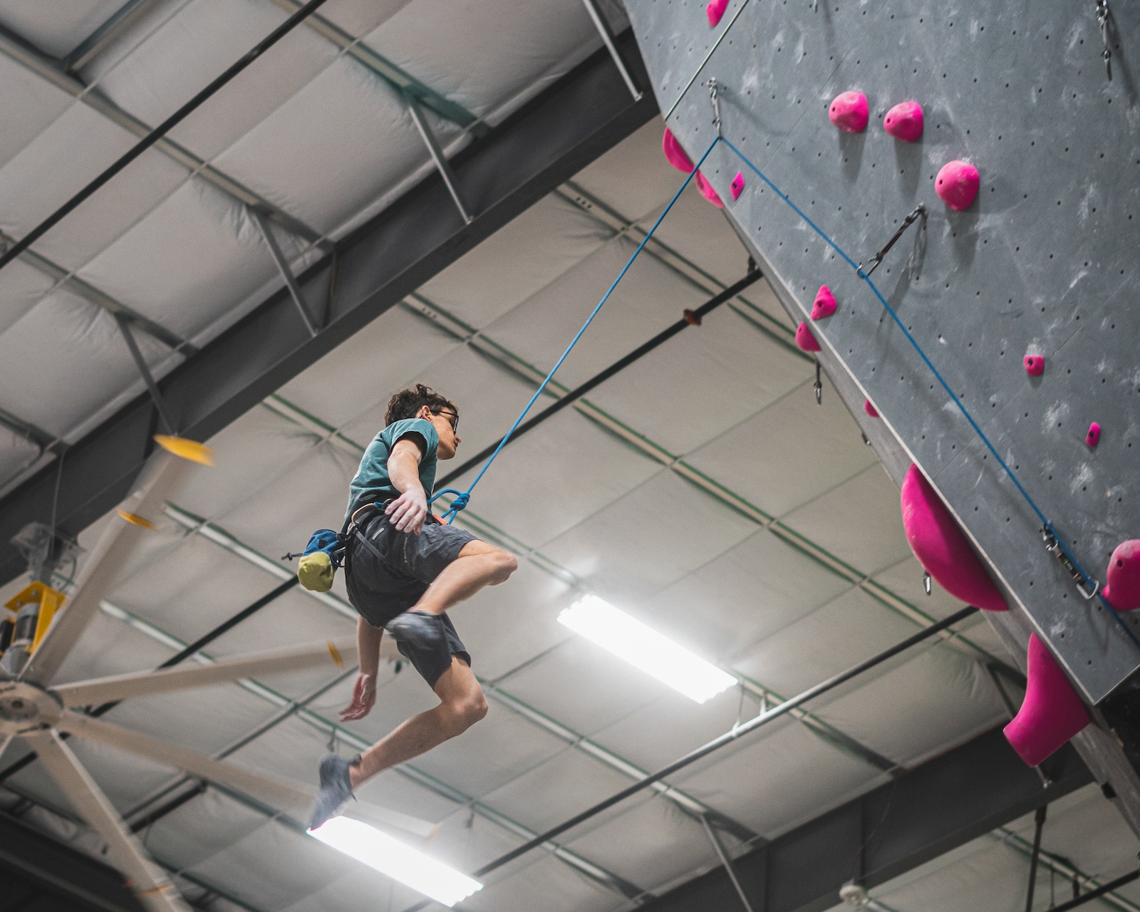 Image of a person rappelling at The Spot Boulder in Colorado