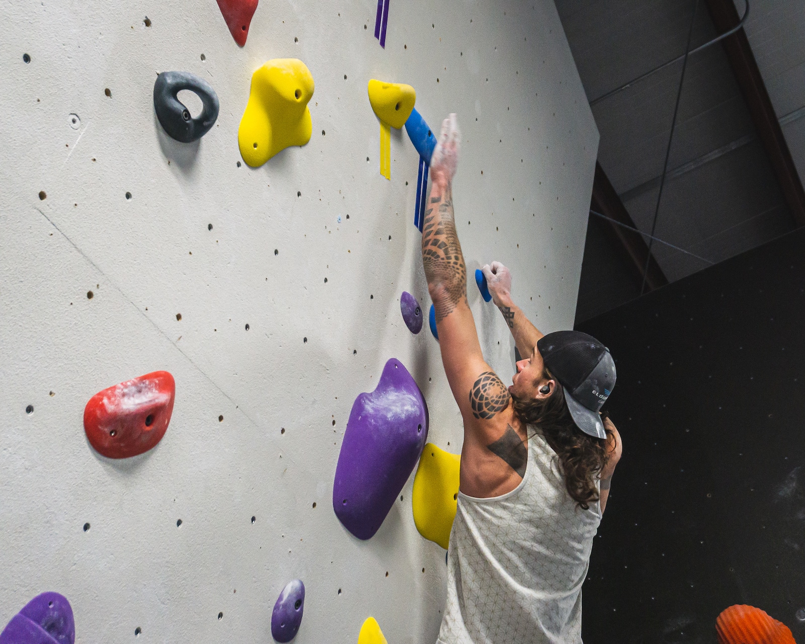 Image of a person bouldering at The Spot Golden in Denver