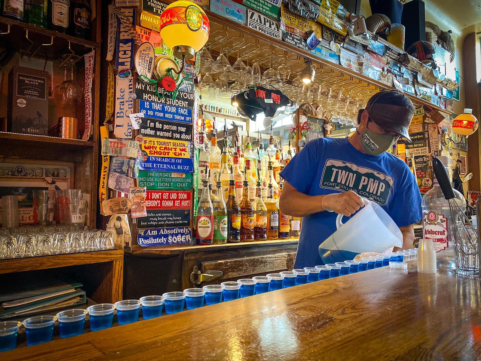 Image of a bartender making jello shots at the Town Pump in Fort Collins, Colorado