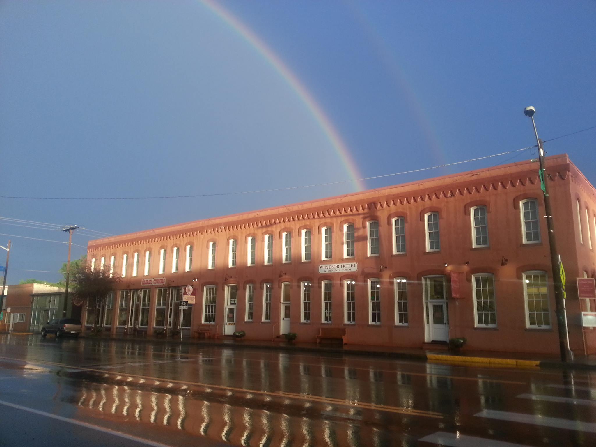 Hotel and rainbow in the sky