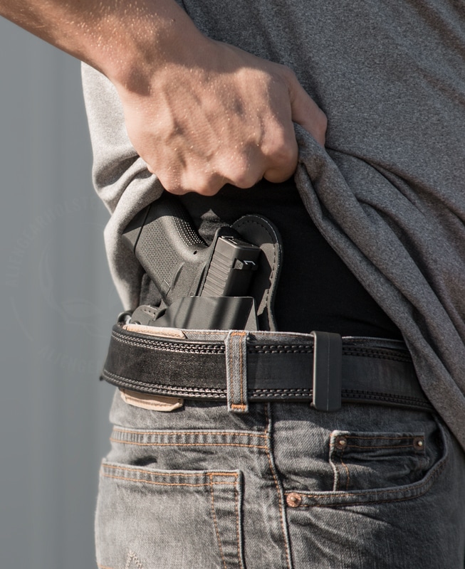 Man with concealed carry gun holster