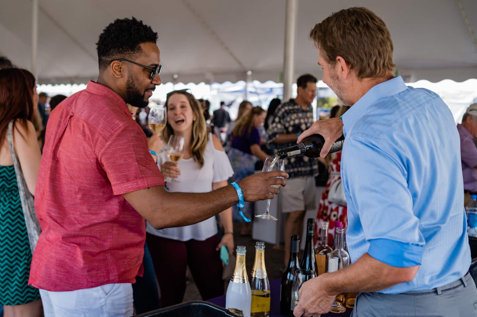 Image of people sampling wine at the Denver Food & Wine Festival in Colorado