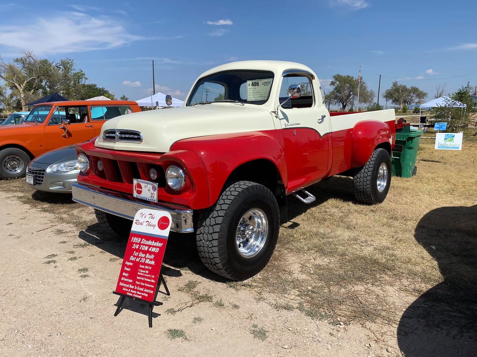 Image of a red truck at the Friends of Raymer Car Show in New Raymer, Colorado