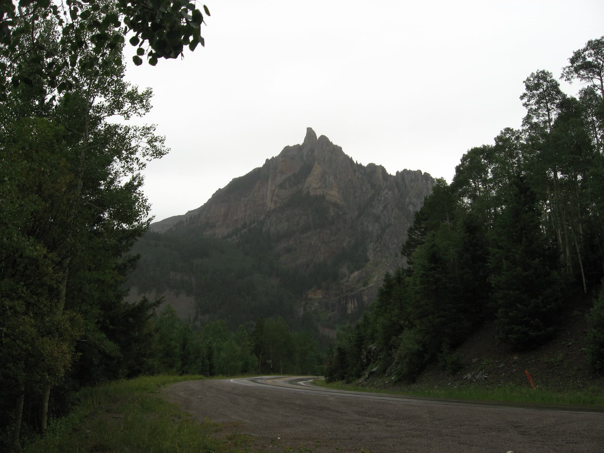 Gloomy day over skyway and mountain