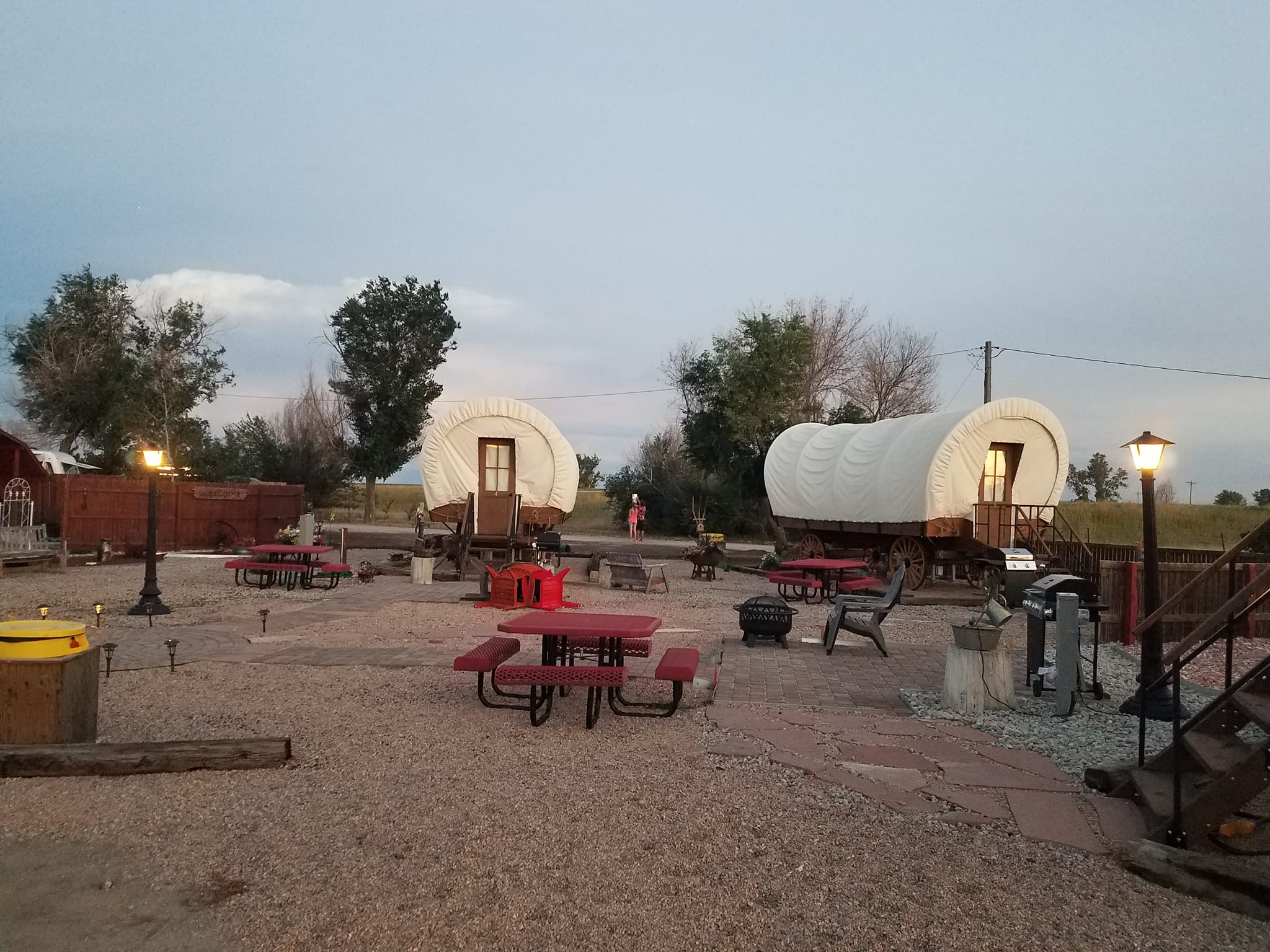 Covered wagons at a campground