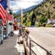 Main street of small town with American flag hanging down